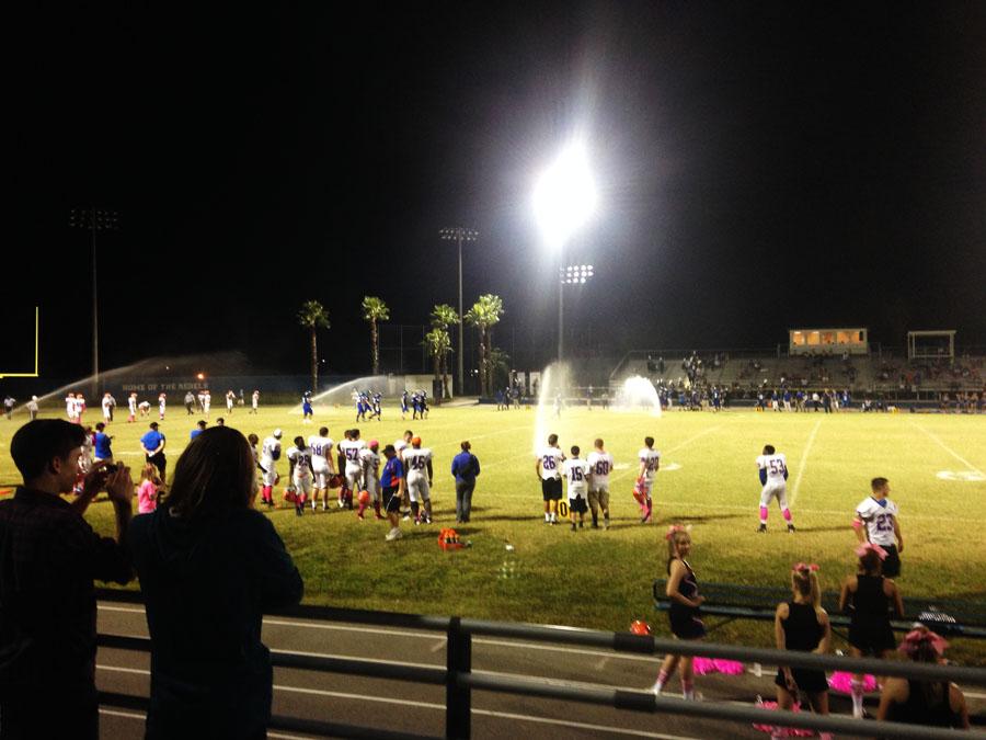 In the 4th quarter, the Dixie Hollins sprinkler system went off, dousing the field with water.