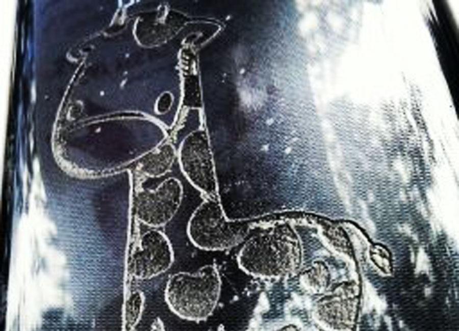 An+engraving+of+a+giraffe+on+a+students+phone.