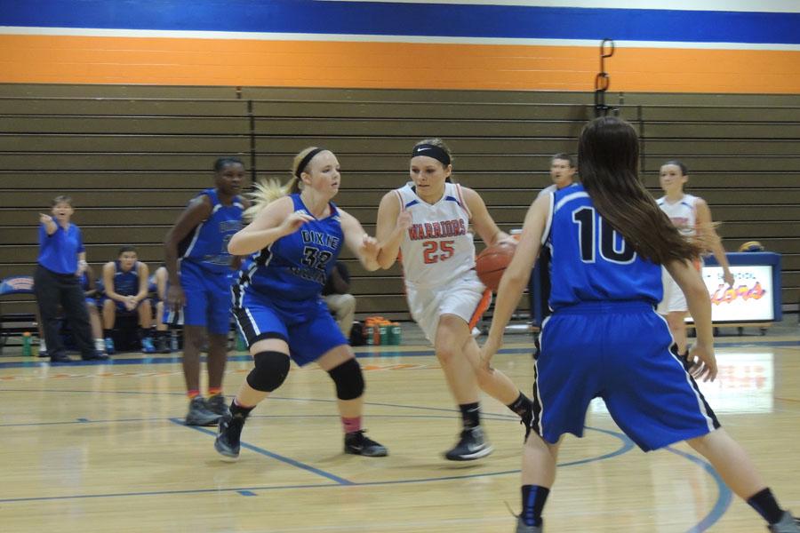 Jamie Green drives toward the basket.