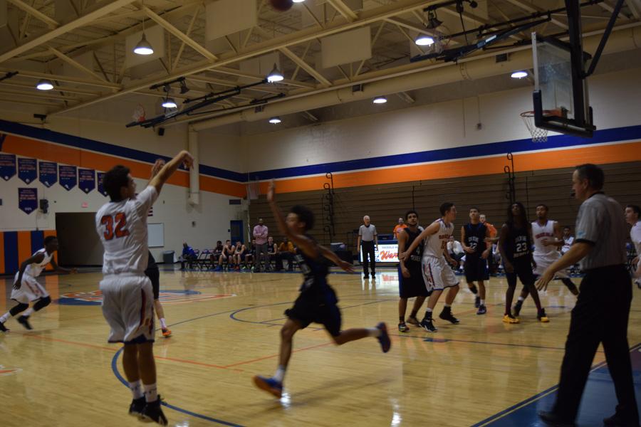 Max Wilkinson, 12th, helps the Warriors  win against the Rebels Thursday night.