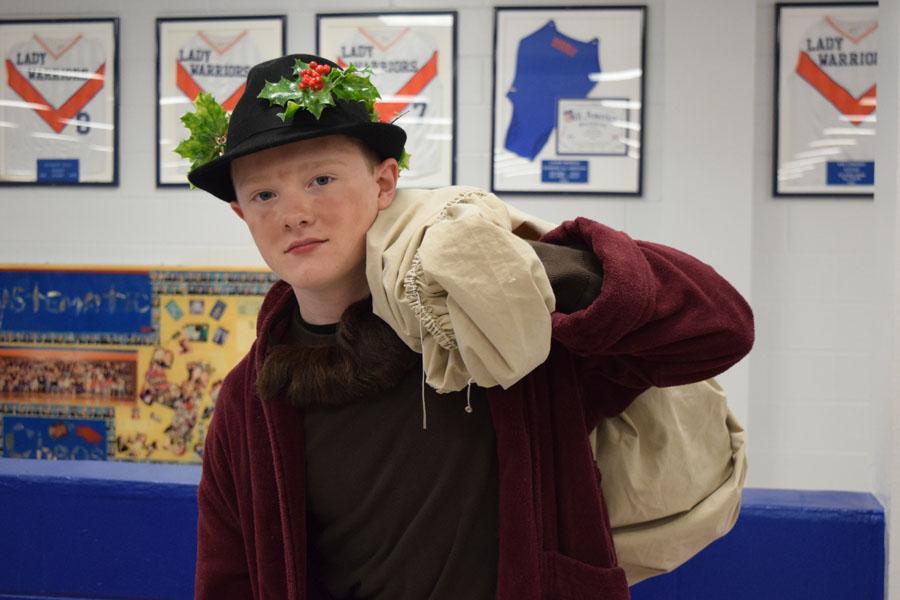 One of the "better dressed" Ugly Sweater Day participants  gets into the holiday spirit.