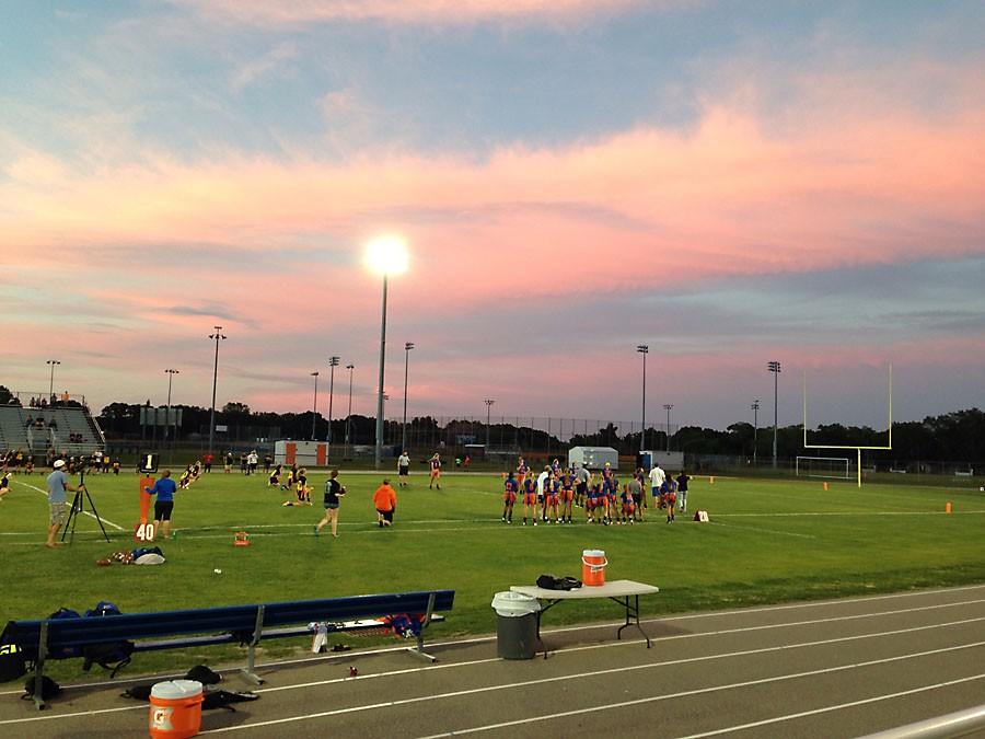 Sun+setting+on+OFHS+football+field+where+the+Warrior+youth+football+summer+camp+will+take+place.