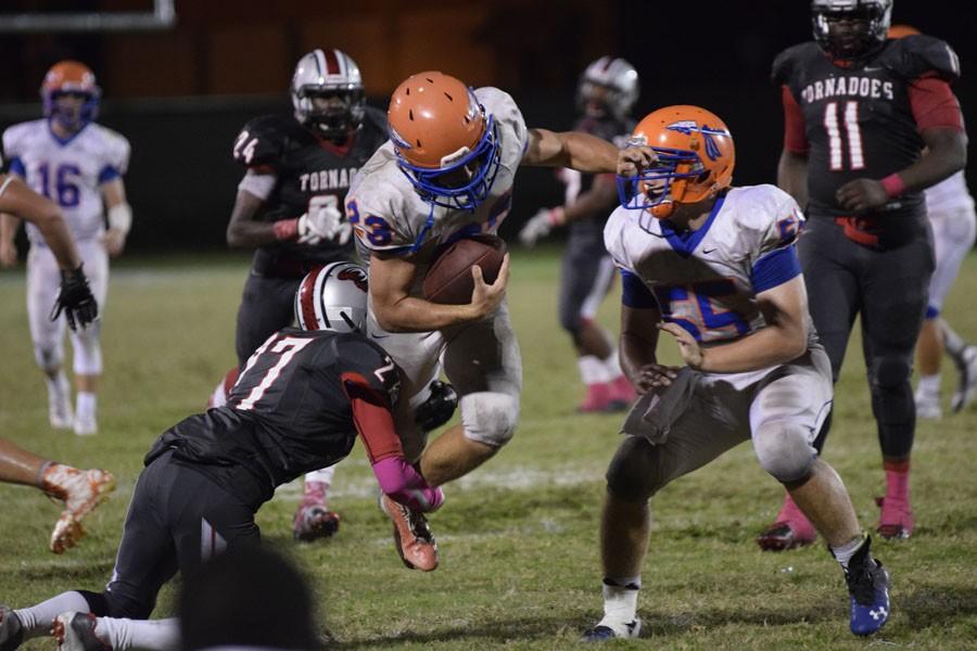 Osceola's football team in action from 2015.