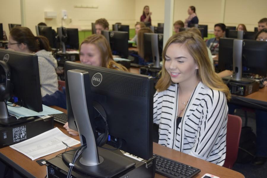 Casey Albert, 11th grade, registers for next year's classes. 