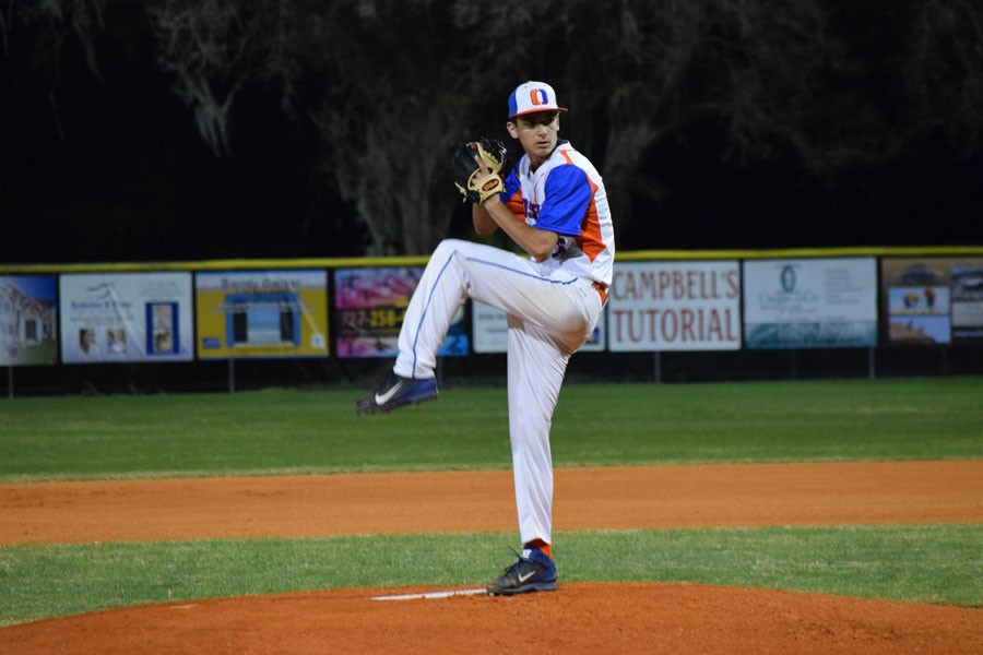 Jeremy Adams winds up a pitch. 