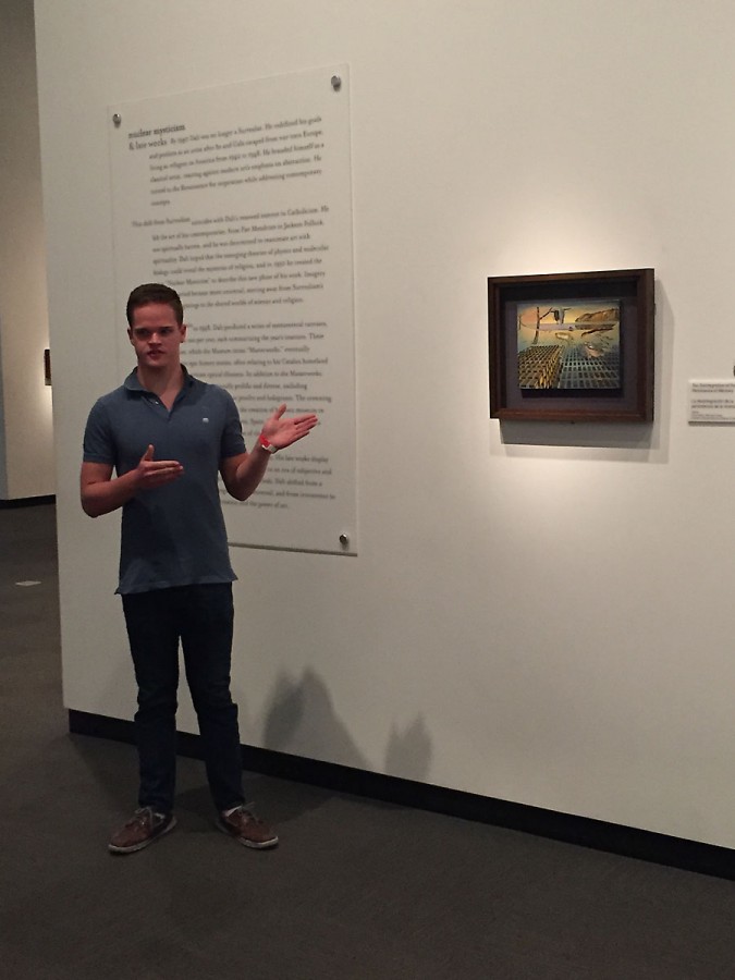 Docent Oliver Allen practices presenting his presentation piece at the Dali. 