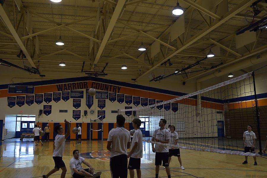 Students participate in a volleyball tournament.  