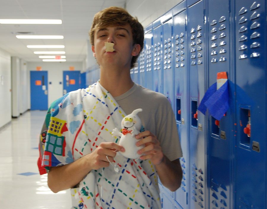 Luke Leskanic shows his excitement for Halloween night while eating a pop tart.