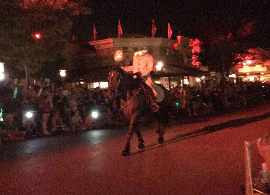 The Headless Horseman leads the "Boo to You" parade in the Magic Kingdom.
