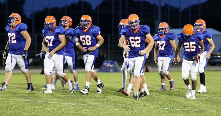 The offense gets ready for the next play to be called at the game against Seminole.