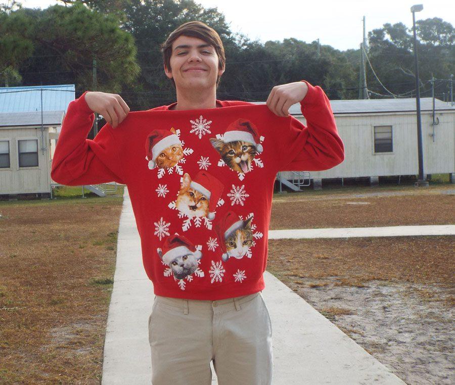 Luke McLeen shows off his Christmas sweater.