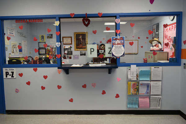 Student services is decorated with pink and red hearts for valentines day.