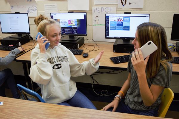 Kelli Slater, left, is very satisfied with her iPhone XR and doesnt see herself purchasing the iPhone 11 in the future.