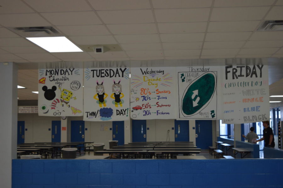 Posters from OFHS 2019 spirit week were hung in the cafeteria. However, the themes have changed in the past few years.