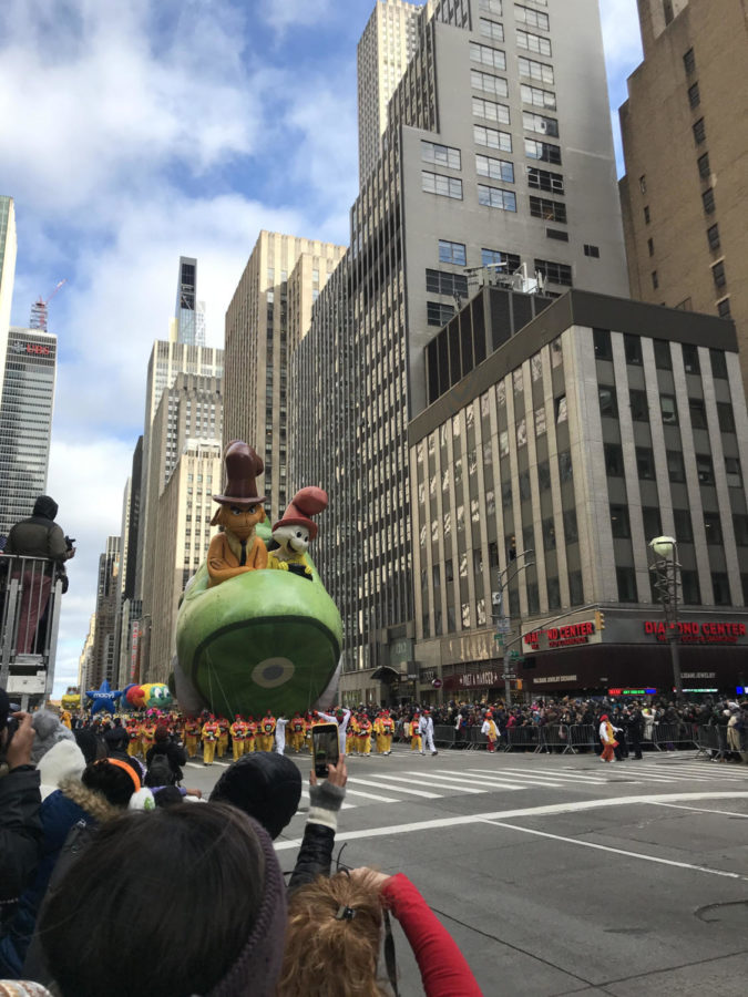 The Green Egg floats down 6th Avenue to take on Turkey Day.