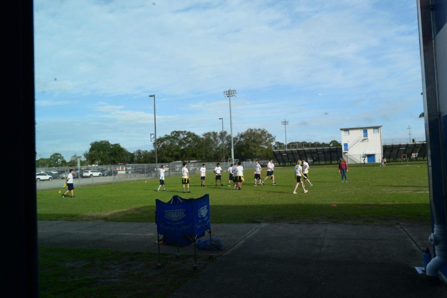 HOPE class is outside, enjoying the first day of warmer weather.