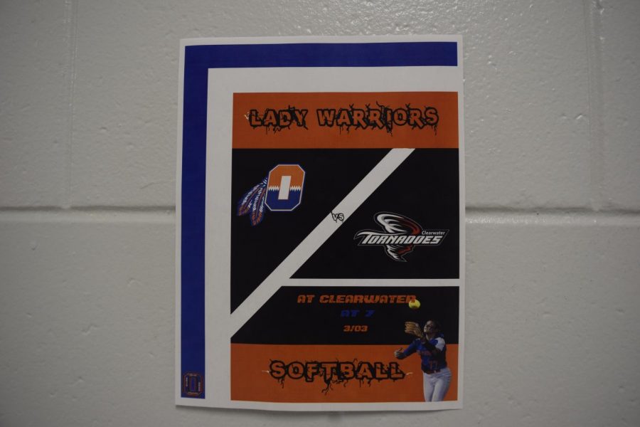 Posters around the school give updates on upcoming softball events.