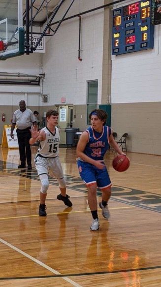 Jack Weber, creates a play for the Warriors in the Keswick High Schools gym.