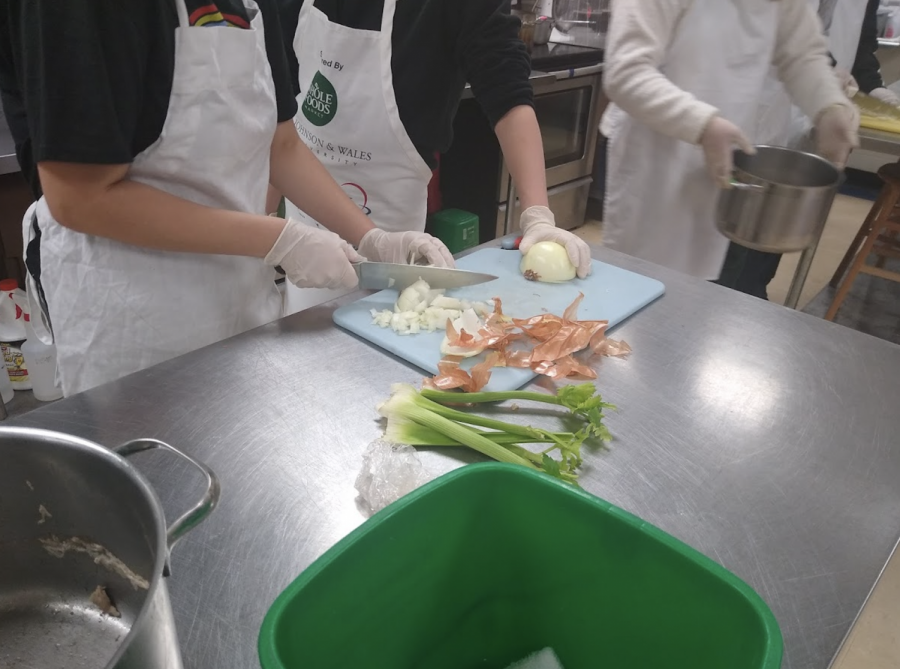 Culinary+1+students+cooking+soup+stock+on+February+4th.