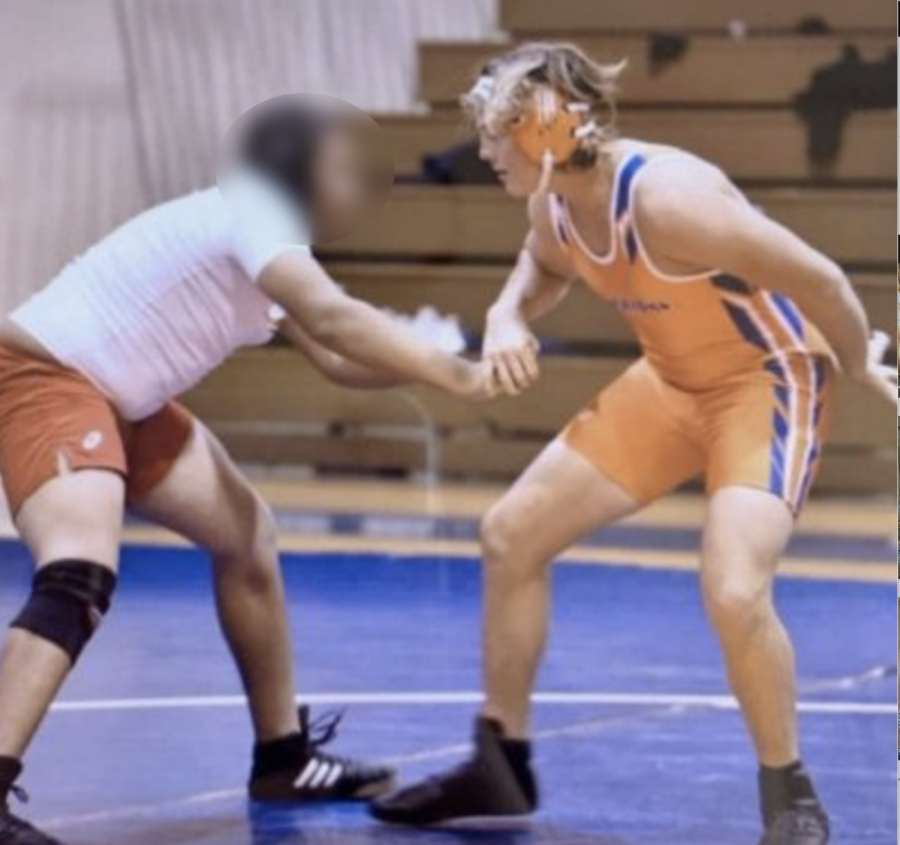 Coltan McClain, senior, during a wrestling match in the 2021 wrestling season. 