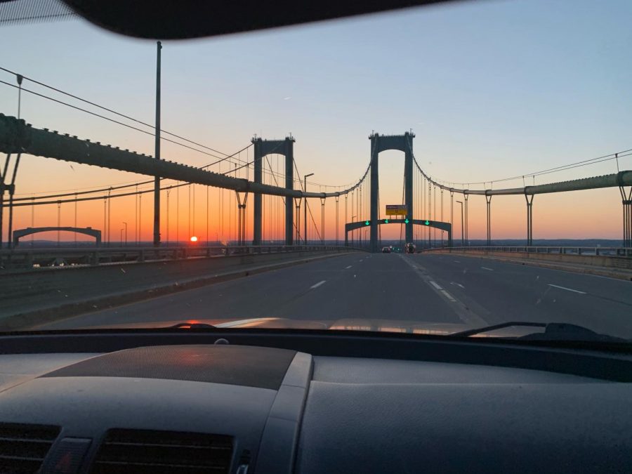 driving over the bridge and watching the evening sunset.