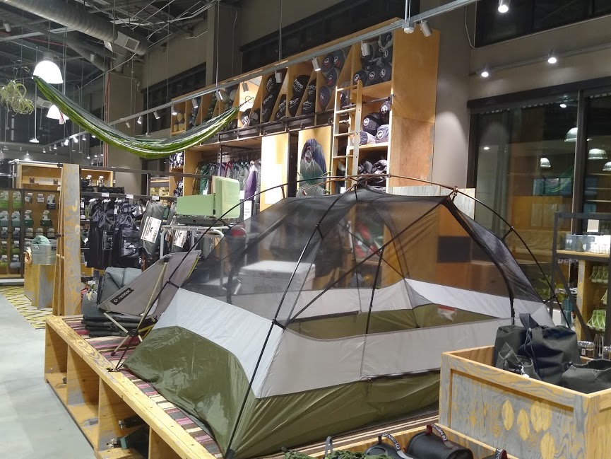 REI has large supply of outdoor gear in its store.