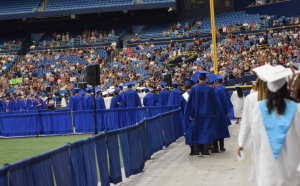 Seniors make their way to their seats.