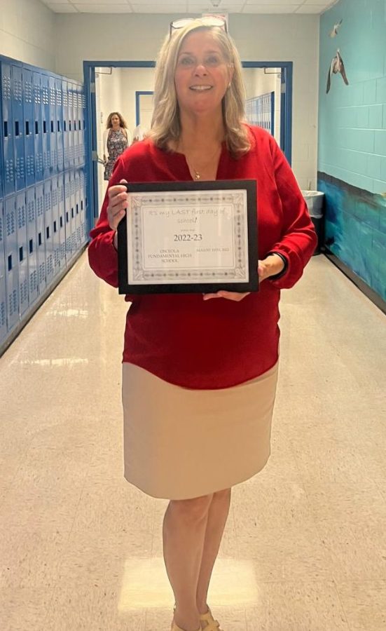 Teacher receiving heart warming gift. 