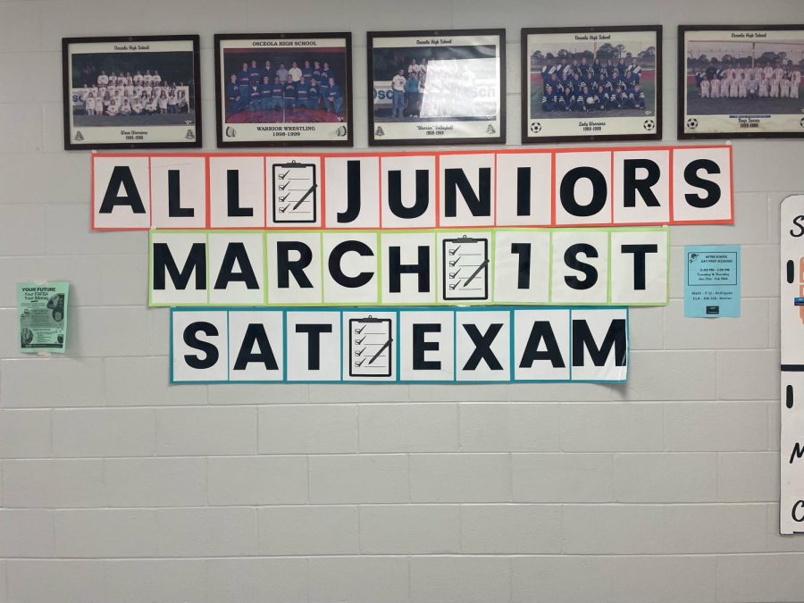 A picture of the poster hung up in the main hallway for the Juniors testing. 