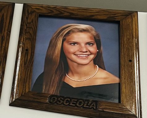 Past Valedictorian Christina Tournant picture hung up in the cafeteria. 