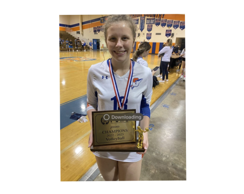 Emily Kilpatrick, 11th grade, wining an award for the 2022-2023 volleyball season. 