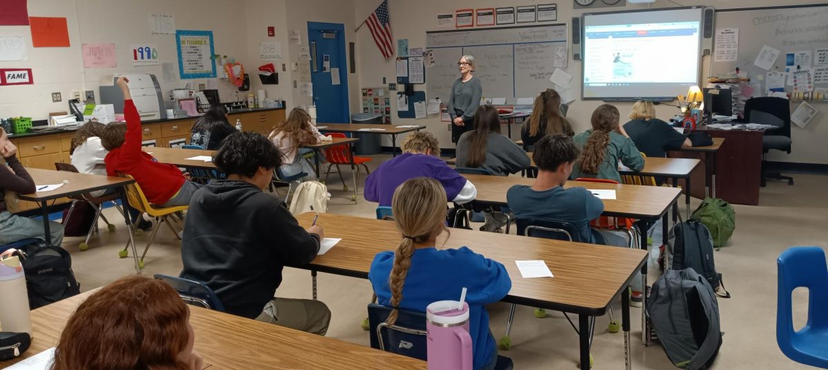 Mrs. Long from the College & Career Center visits Journalism students.