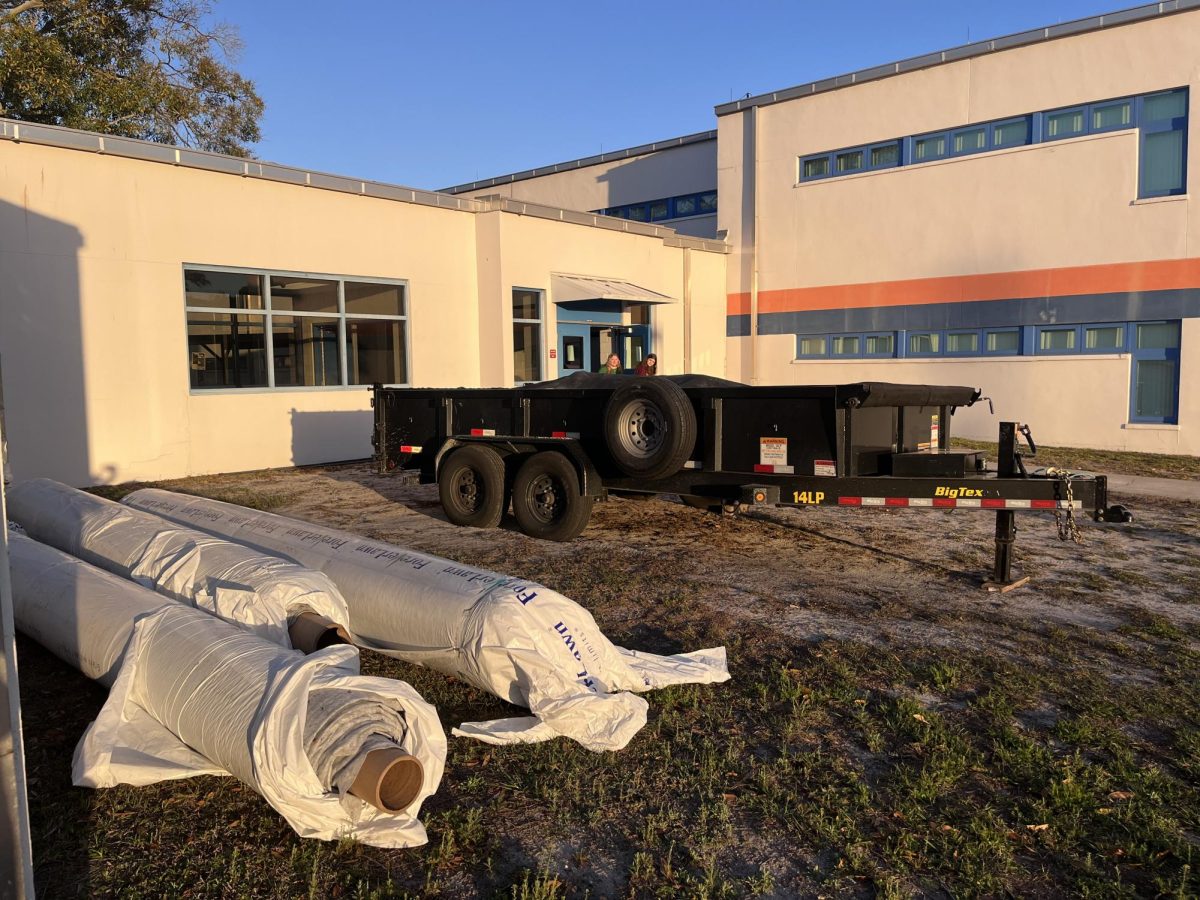 Plant operations is working on a project on campus to lay down turf around the ground area of the portables.