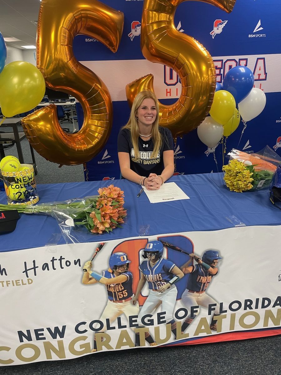 Hannah+Hatton+signing+for+a+softball+scholarship+at+New+College+of+Florida.+