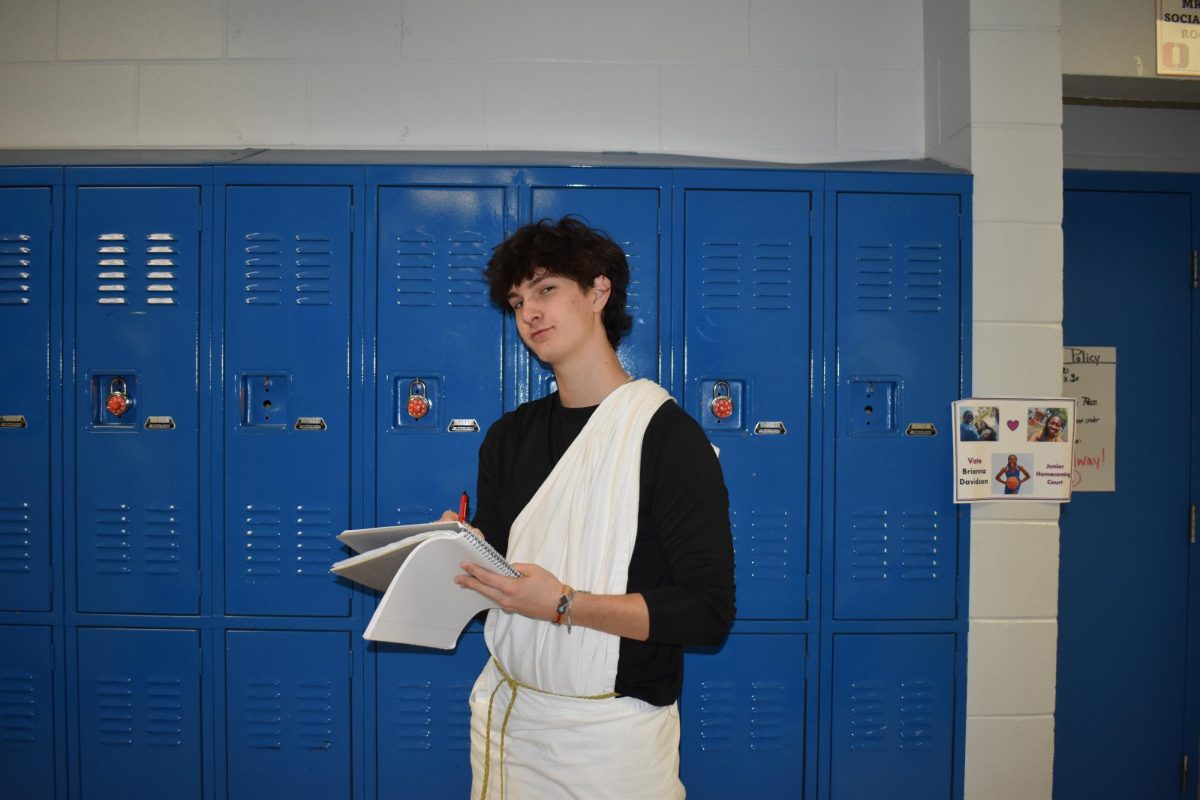  A Senior dresses up in a toga on the last day of spirit week.