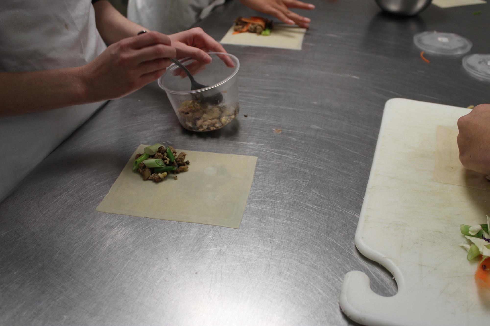 Egg roll filling placed on dough