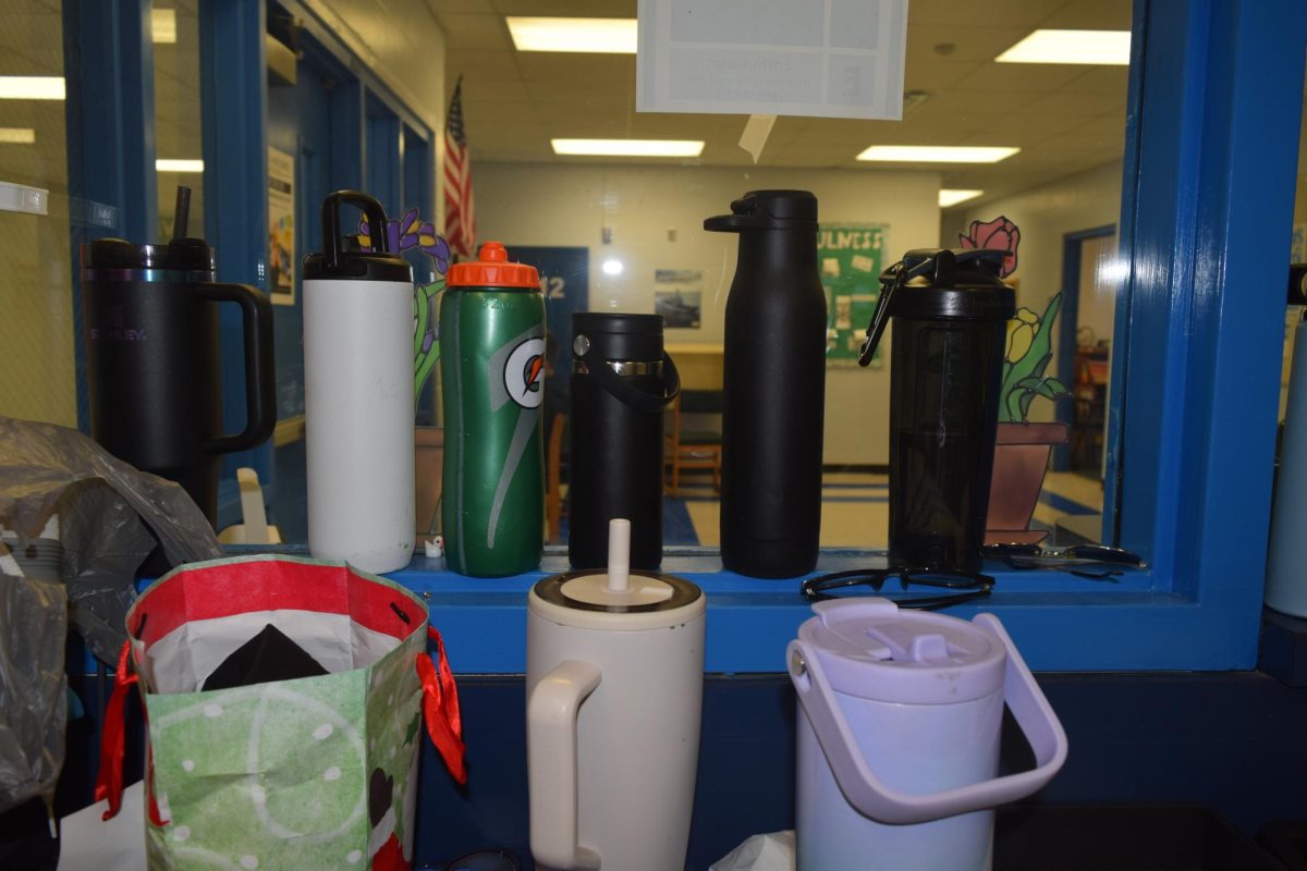 There is a wide assortment of water bottles.