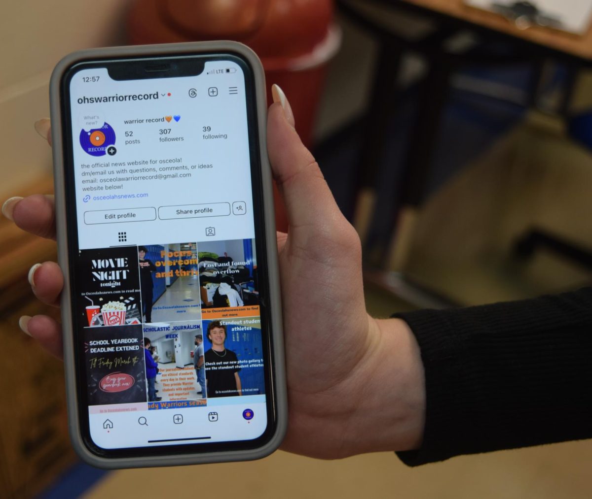 A student showing her phone following Instagram warrior record.