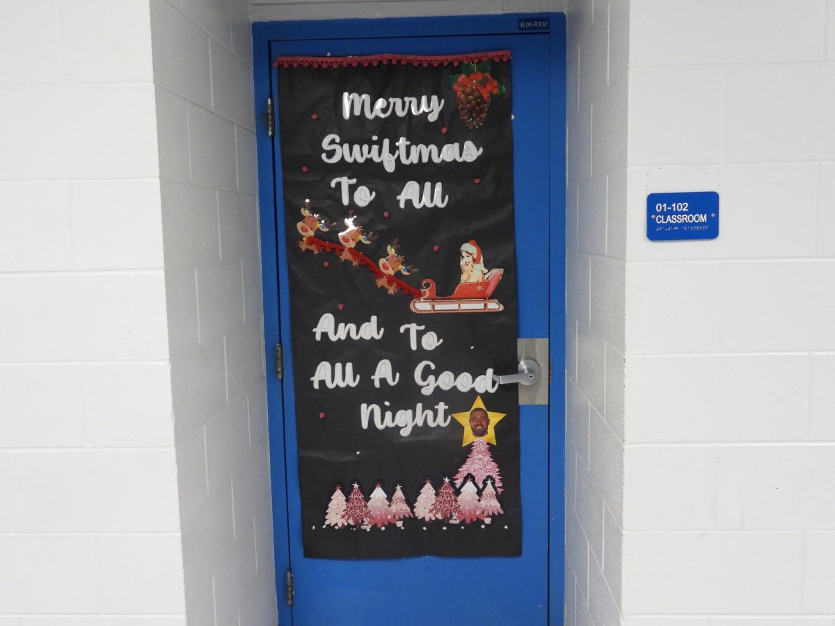 Mrs. Turner decorated her door for a very merry swiftmas.