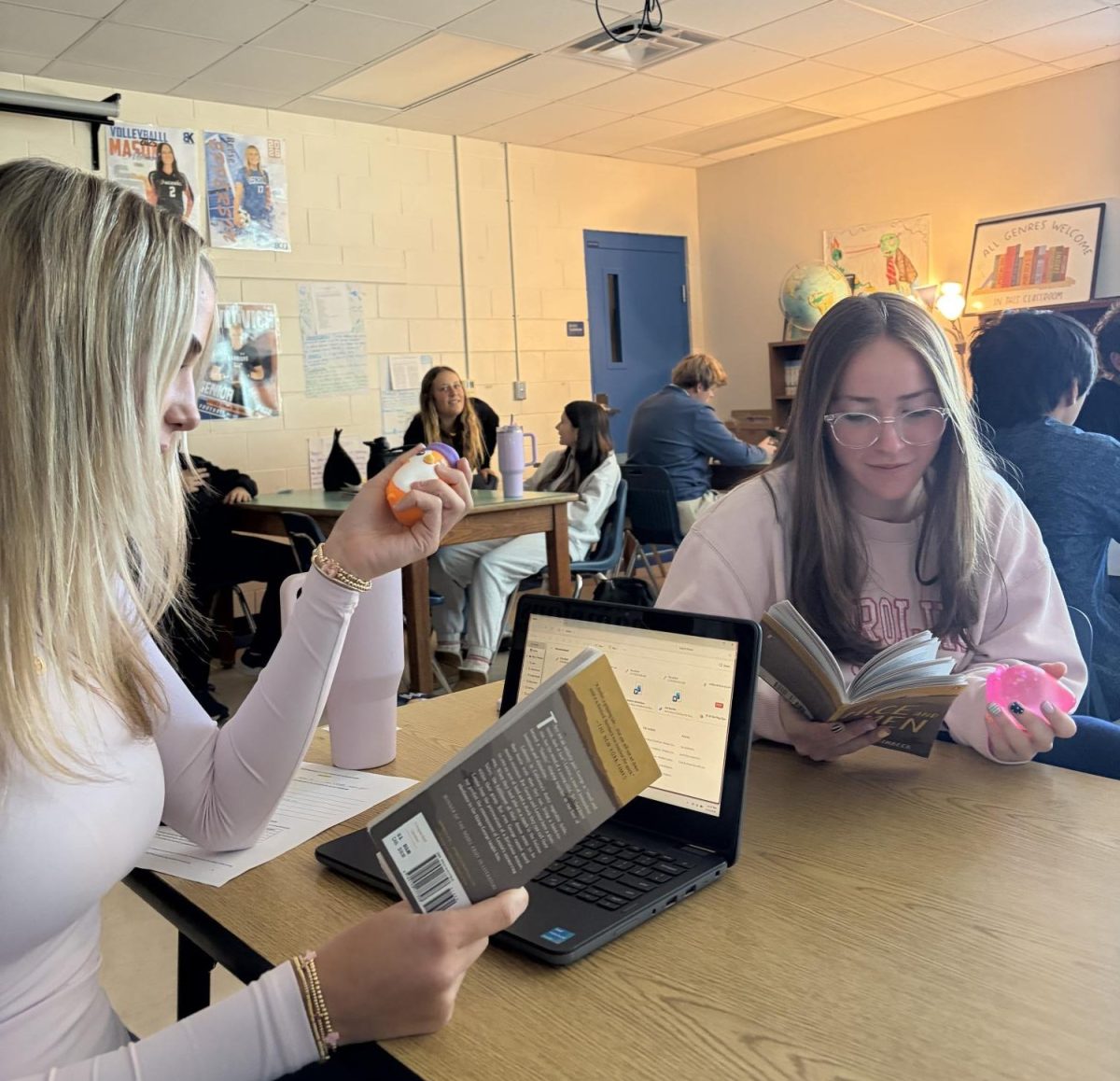 Even when reading a book, juniors Mary Lerch and Ella Tumarkin always have fidgets in hand! 
